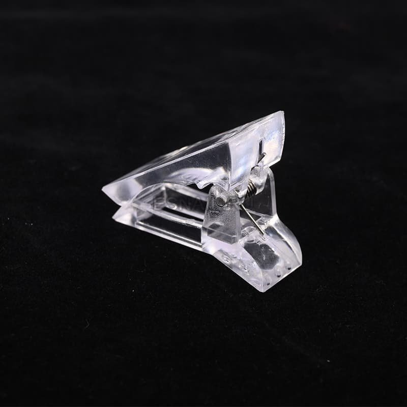 Зажим фиксирующий пластиковый (цвет: прозрачный, голубой, фиолетовый)